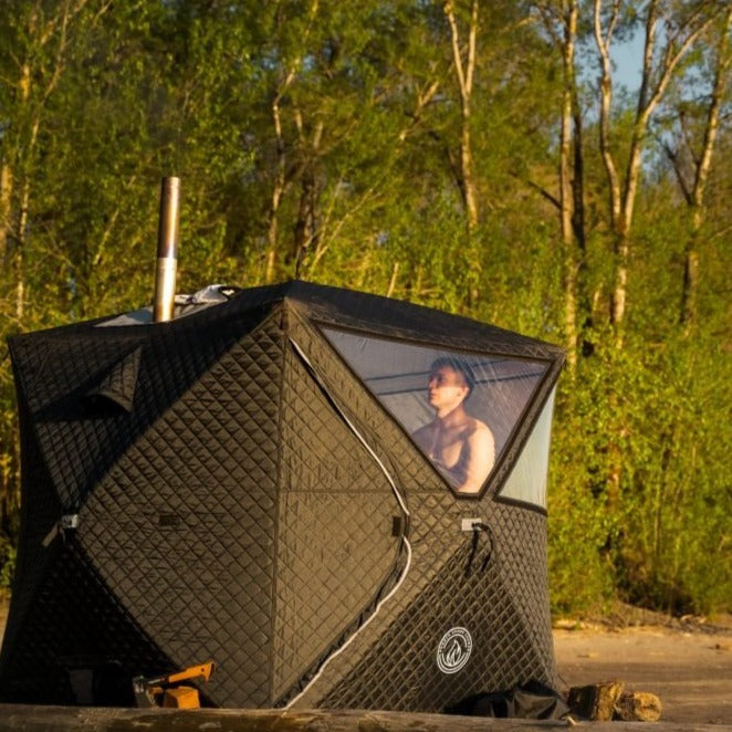 Prism portable sauna tent, setup outdoors on beach